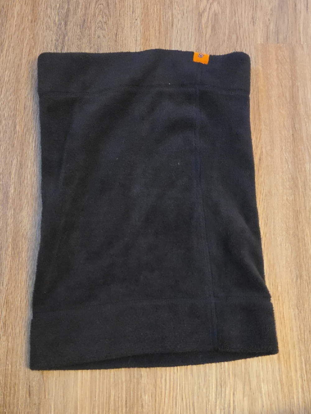 Black Sunmeci Neck Warmer with Orange Tag